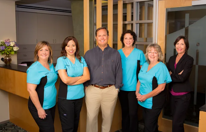Photo of Endodontist Dr. Tancreto and his staff at {PRACTICE_NAME}