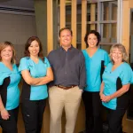 Photo of Endodontist Dr. Tancreto and his staff at {PRACTICE_NAME}