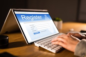 Person using a laptop to register
